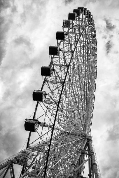 istock Looking upwards of a Giant Ferris Wheel 2202383282