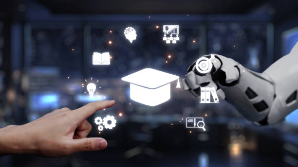 istock Human Hand Interacting with Robotic Arm Displaying Educational Icons Against a Futuristic Background in Technology and Learning Concept. Auvana 2202391006