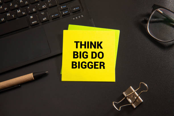 istock Think Big, Do Bigger Motivation quote written on a note paper 2202397926
