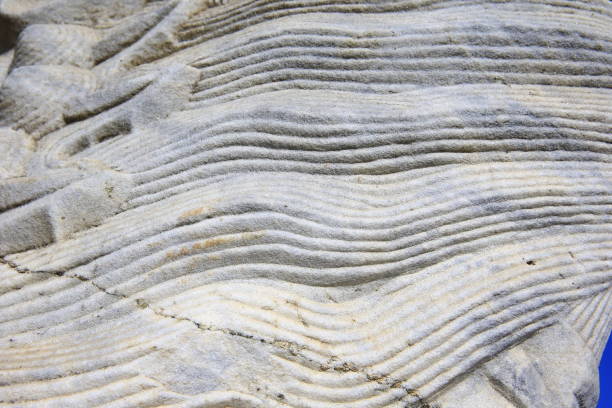 Vintage ornament on the stone. Close-up seamless texture. Stone texture. Pattern on the stone. Embossed pattern.
