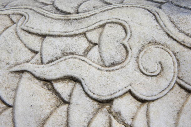 istock Vintage ornament on the stone. Close-up seamless texture. Stone texture. Embossed pattern. 2202398996