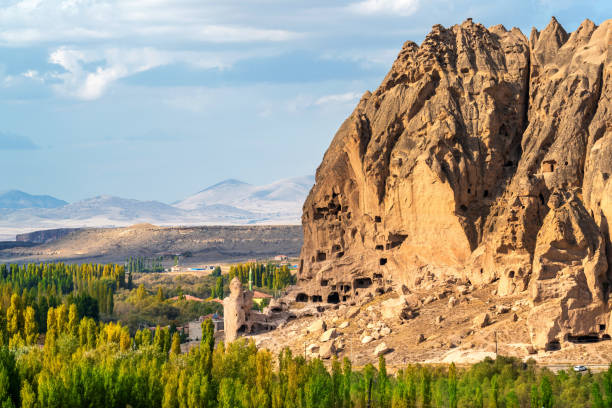 Ancient cave house near Goreme, Cappadocia in Turkey. stock photo