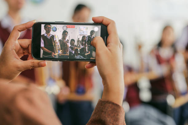 istock Group Of Students With Disabilities Learning Traditional Music At The Classroom 2202407203