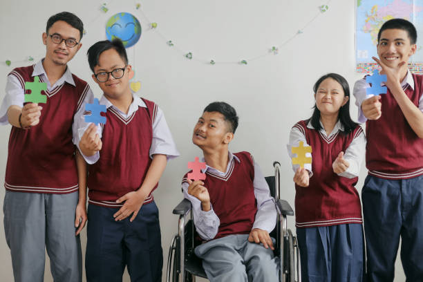 istock Portrait Of Group Students With Disabilities 2202407782