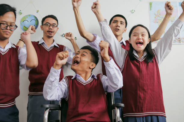 istock Portrait Of Group Students With Disabilities 2202408852