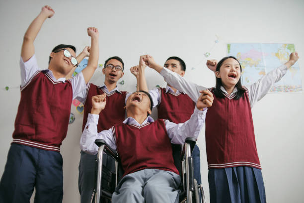 istock Portrait Of Group Students With Disabilities 2202409878