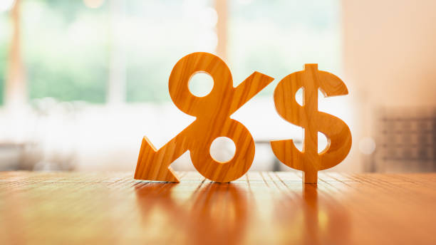 istock Percentage model and down arrow with dollar sign, Key concepts for success, methods, systems of raising or lowering Fed interest rates to correct inflation concepts. 2202418259