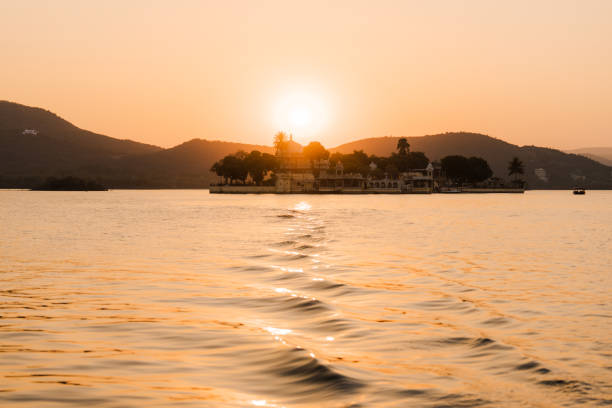Scenic view of Udaipur architecture at Lake Pichola at sunset