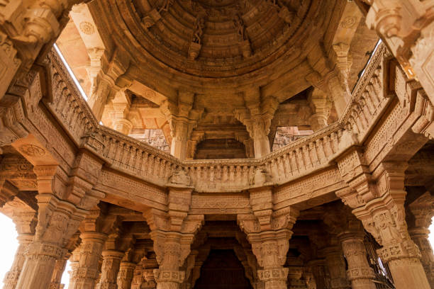 India. Rajasthan state. Ranakpur. Chaumukha Temple, also called the Ranakpur Temple dedicated to Lord Adinatha. Bas relief sculpture of Tirthankara