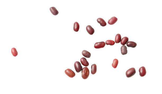 istock A bunch of red beans scattered on a white background 2202426675