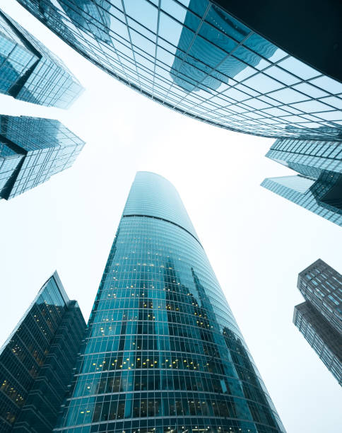 istock A tall building with a glass facade is seen from above 2202427110