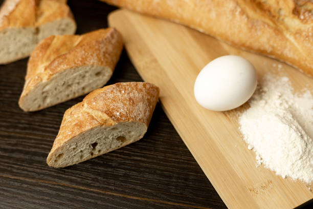 Flour, egg, bread close-up.Homewort pastries.Slices of sliced bread on the table