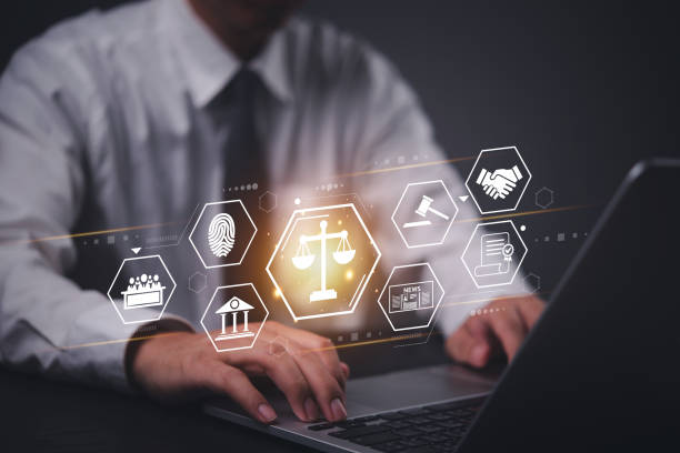 istock Businessman using a laptop with a digital law and justice interface, representing online legal services. regulations with AI legal services and technology. 2202438041