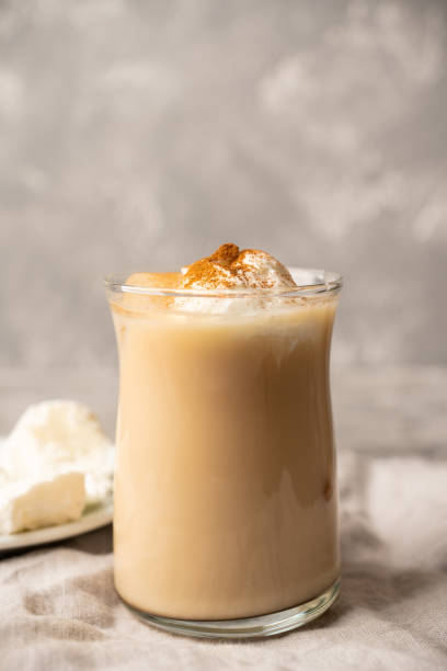 istock Coffee with ice cream and cinnamon in glass cup 2202439816