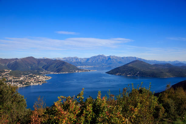 istock panoramic view of a picturesque lake surrounded by towering mountains 2202440330