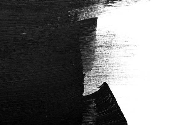 A high-contrast abstract composition featuring bold black and white paint brushstrokes. The rough texture and expressive movement create a dynamic and artistic visual, evoking themes of contrast, creativity, and modern design.