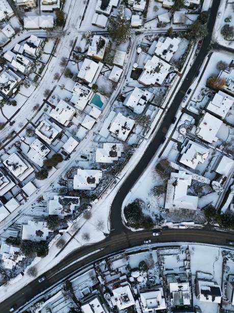 istock Aerial view of rooftops covered in snow, Vancouver 2202444084