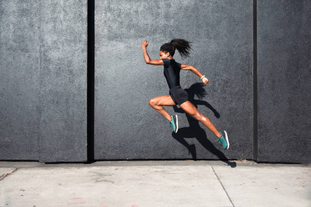 istock Sporty and powerful woman 2202446195