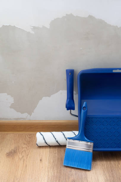 istock tools for painting walls on the floor 2202457400
