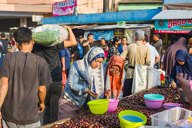 Bekasi. Indonesia. February 28, 2025: Buying and selling transactions in traditional markets