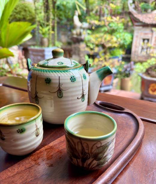 istock Tea ceremony, porcelain tableware on wooden tray, Asian tradition 2202460016