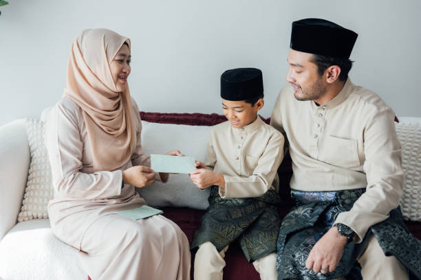 istock Celebrating Hari Raya: A Special Moment of Giving with Raya Envelopes 2202462166