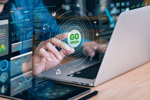 Businessman interacting with a digital interface displaying sustainability with Go Green
