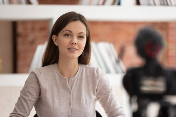 istock Caucasian female coach record online course on camera 2202465228