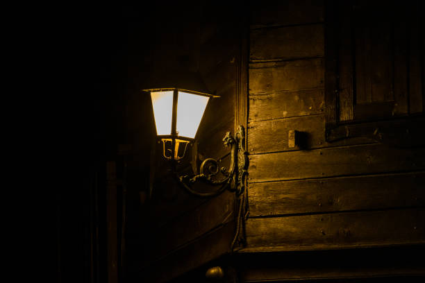 Old city lantern in street at night