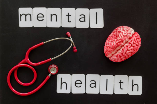 istock Human brain model with red stethoscope, top view. Mental health concept. 2202469912