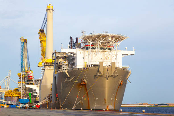 istock Heavy Lift offshore vessel is moored at a seaport. 2202472283