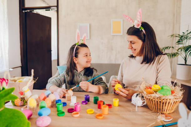 istock Happy mom and daughter enjoy for Easter. 2202476241