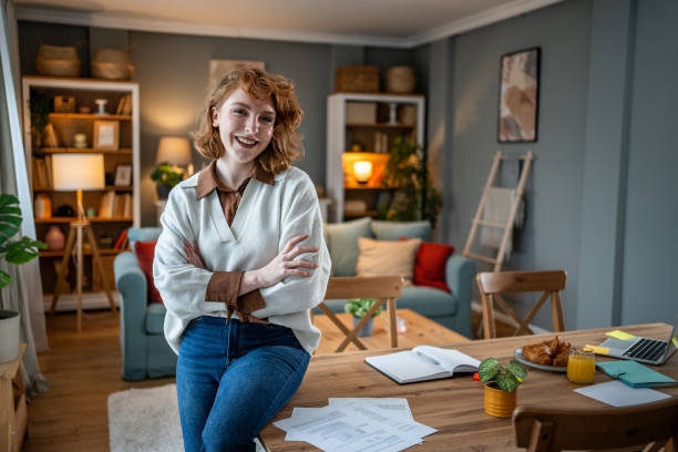 istock Young freelancer smiling with confidence in her home office 2202478990
