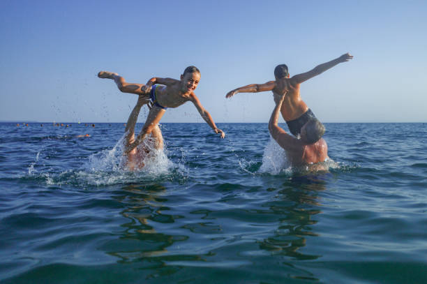istock Children Flying into the Sea 2202479130
