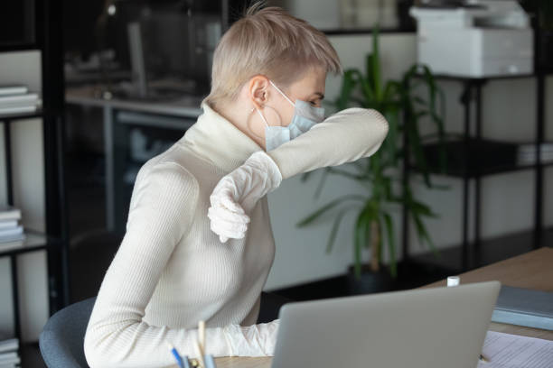 istock Sick female employee cough get covid-19 infection 2202482706