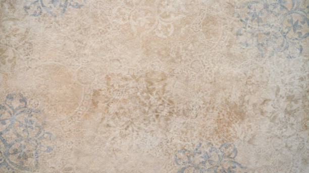 istock Old brown gray rusty vintage worn shabby patchwork motif tiles stone concrete cement wall texture background banner 2202484363
