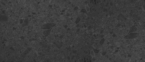 istock Gray grey anthracite black dark natural tile stone wall floor background banner panorama, italian venetian ceppo di gré, terrazzo, matt pithy stone texture 2202484611