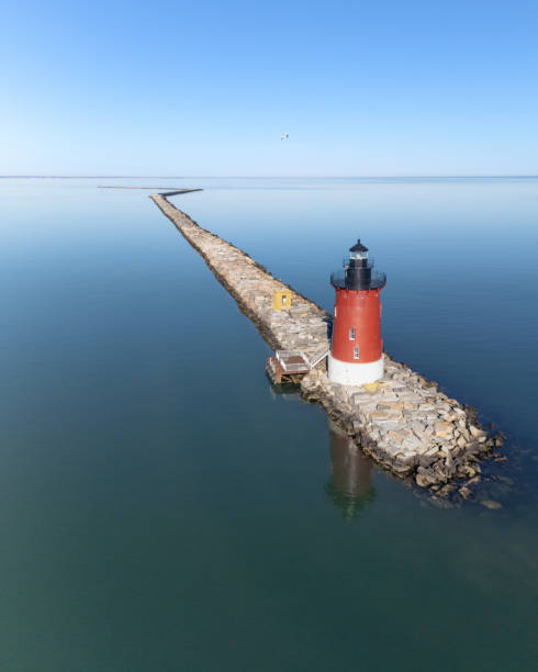 istock East End Lighthouse by Drone - Portrait Orientation 2202486713