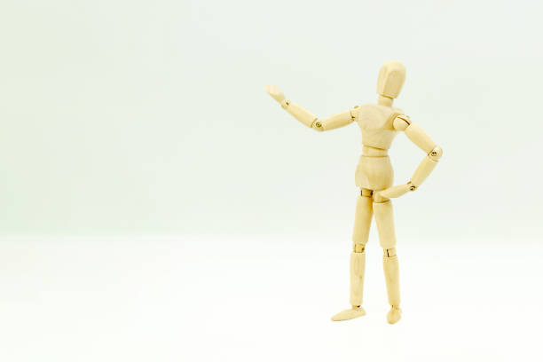 istock Wooden man on white background shows space for copy and text 2202488467