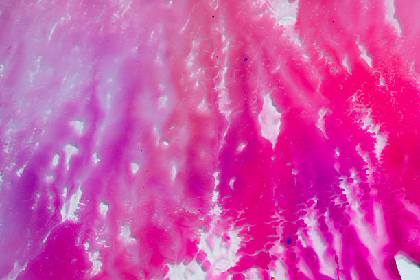 A Pink Shower Gel Liquid Slime Poured on a White background