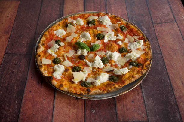 istock A pizza with cheese and basil on top 2202495761
