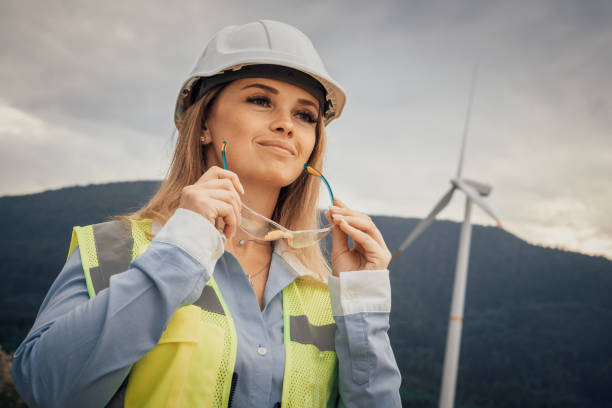 istock An accomplished female engineer at a wind farm, she excels in renewable energy and sustainability, showcasing leadership and innovative ideas that advance the industry and promote a greener future 2202497833