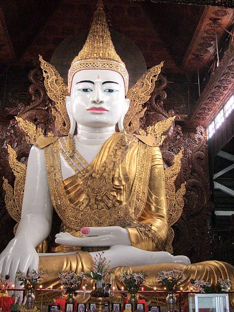 istock A majestic seated Buddha dressed in gold 2202500697