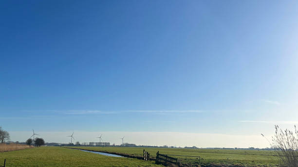 istock Sky on the meadow in the winter 2202503567