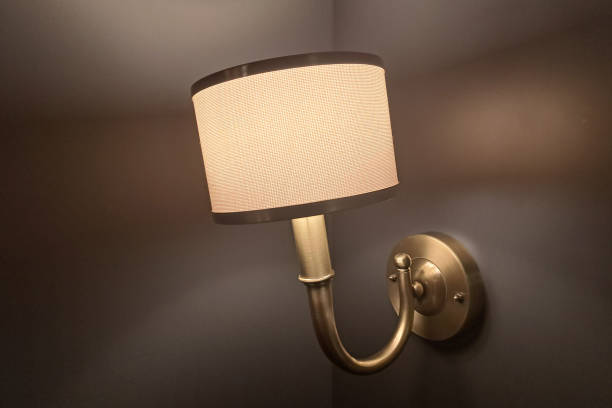 istock Modern interior lamp with warm lighting. Elegant home decor and furniture accessory. 2202505208