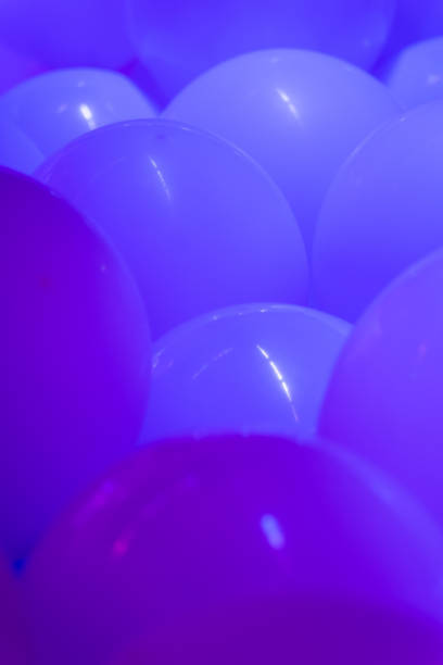 istock Dark blue rubber balloons bubbles close up 2202506858