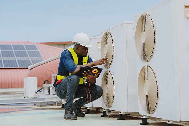 istock Engineers are checking the air conditioning and cooling system in a commercial building. 2202509793