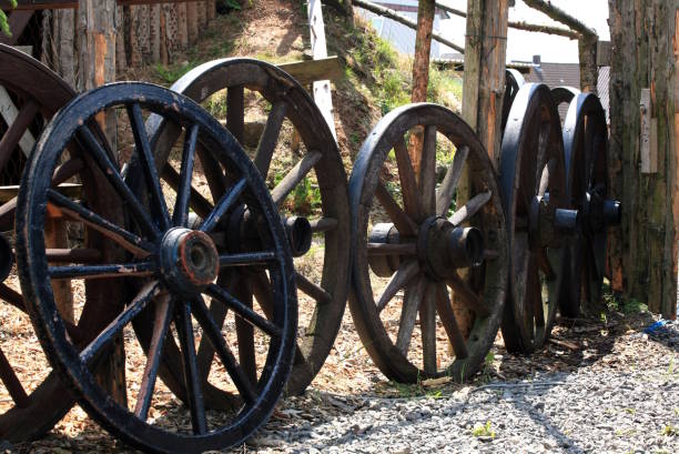 istock Old wooden wagon wheels 2202513537