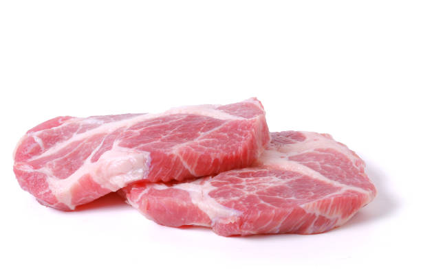 Fresh red pork, cut into pieces. isolated on white background.