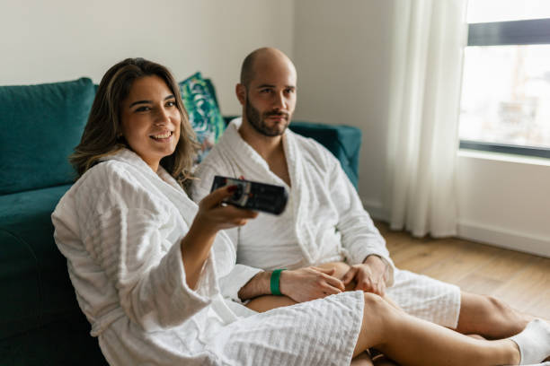 istock Young couple watching TV 2202517287